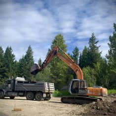 Excavator digging for footings