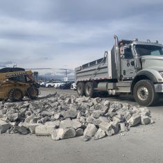 Bobcat Breaking Concrete
